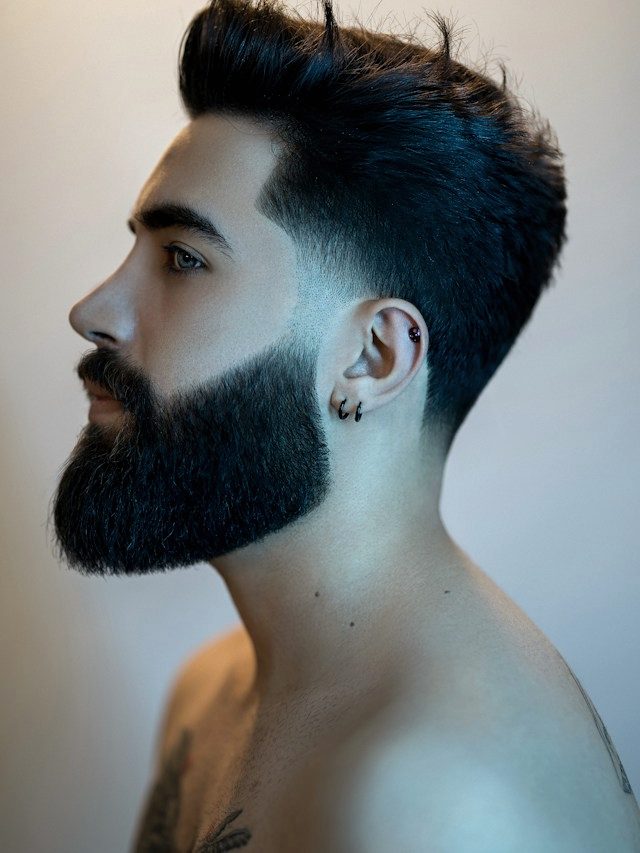 A sculpted beard photographed in profile.