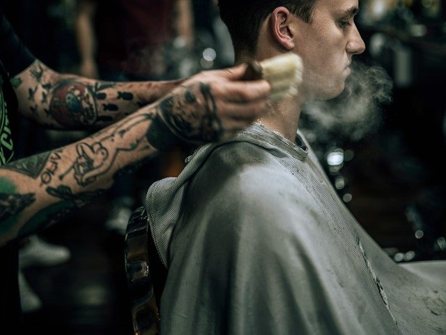 A Signature Cut being finished with scissors over comb.